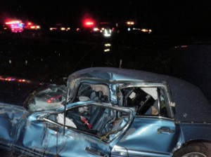 car-crashed-in-woods-at-night